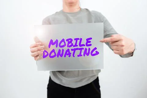 Conceptual display Mobile Donating. Concept meaning to give something to a Foto stock