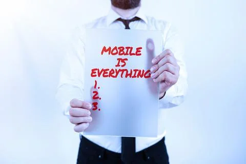 Conceptual display Mobile Is Everything. Word for Handheld Computer Device a Stock Photos