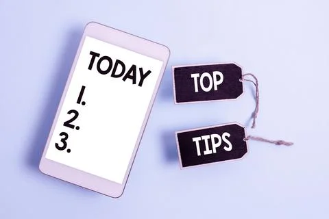 Conceptual display Top Tips. Word Written on small but particularly useful piece Stock Photos