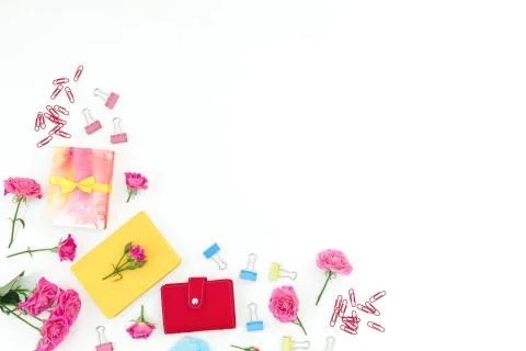 Conceptual frame with notebook, eucalyptus, gift and roses on white backgroun Stock Photos
