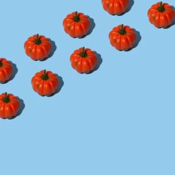 Conceptual halloween pattern with decorative pumpkin on a blue background wit Stock Photos