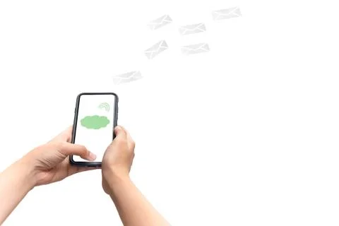 Conceptual hand using cell phone with digital icon isolated in white background. Stock Photos
