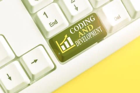 Conceptual hand writing showing Coding And Development. Business photo text Stock Photos