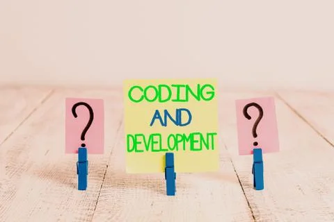 Conceptual hand writing showing Coding And Development. Business photo text Stock Photos