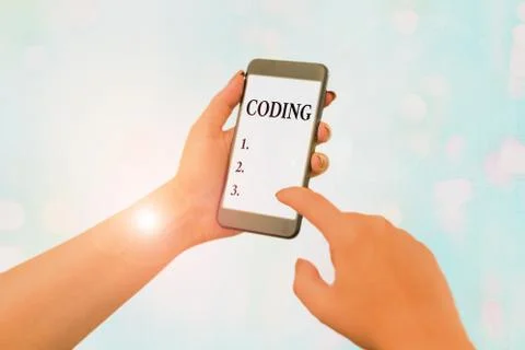 Conceptual hand writing showing Coding. Business photo text assigning code to Stockfoto's