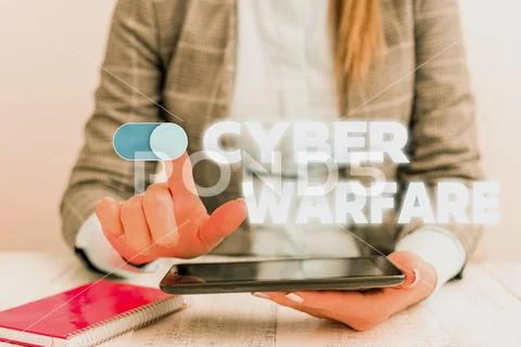 Conceptual hand writing showing Cyber Warfare. Business photo showcasing Virtual Stock Photos