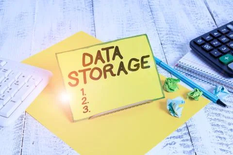 Conceptual hand writing showing Data Storage. Business photo text the act of 스톡 사진