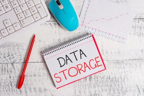 Conceptual hand writing showing Data Storage. Business photo text the act of 스톡 사진