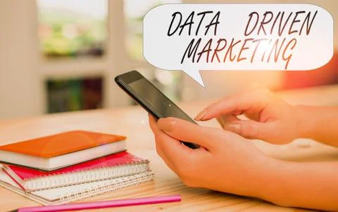 Conceptual hand writing showing Data Driven Marketing. Business photo text Stock Photos