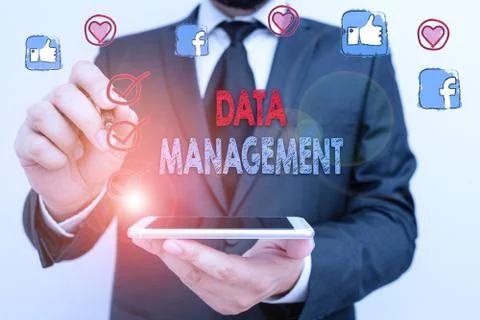 Conceptual hand writing showing Data Management. Business photo text disciplines Stockfoto's
