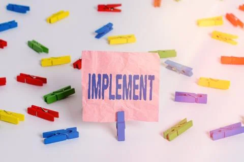 Conceptual hand writing showing Implement. Business photo text give practical Foto stock