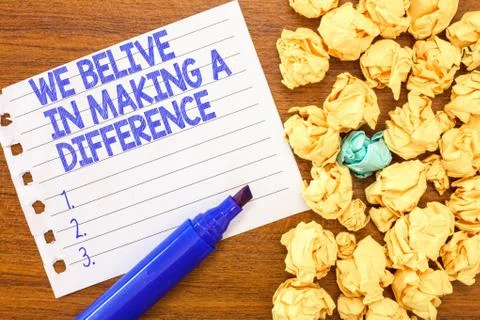 Conceptual hand writing showing We Believe In Making A Difference. Business Stock Photos