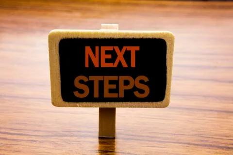 Conceptual hand writing text caption inspiration showing Next Steps. Business Stock Photos