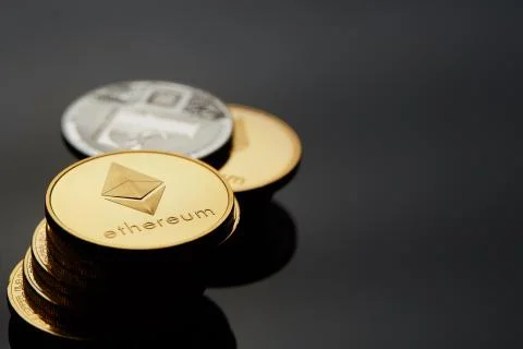 Conceptual image of different cryptocurrency with bitcoins on dark table, close Stock Photos