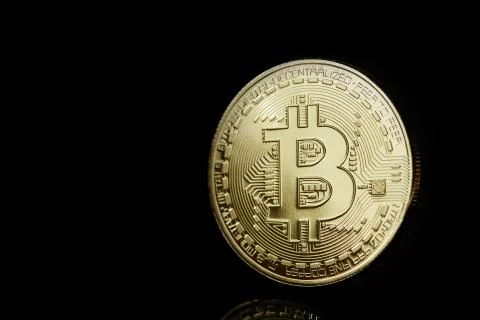 Conceptual image of different cryptocurrency with bitcoins on dark table, close Stock Photos