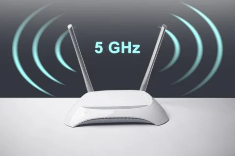 A conceptual image featuring a minimalist white wireless internet router wi.. Stock Photos