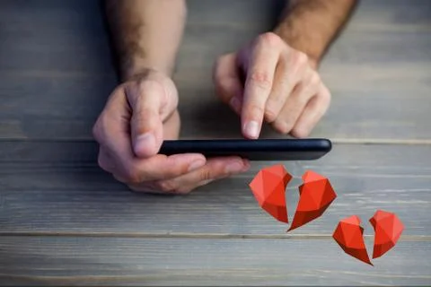 Conceptual image of man hands texting on mobile phone with digital generated red Foto stock
