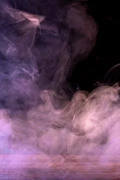 Conceptual image of multi-colored smoke isolated on dark black background a.. Stock Illustration