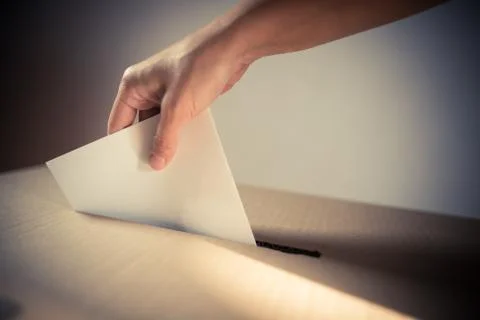 Conceptual image of a person voting during elections Stock Photos