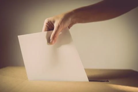 Conceptual image of a person voting during elections Stock Photos