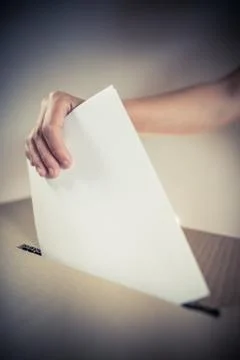 Conceptual image of a person voting during elections Stock Photos