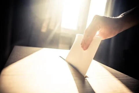 Conceptual image of a person voting during elections Stock Photos
