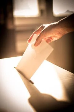 Conceptual image of a person voting during elections Stock Photos
