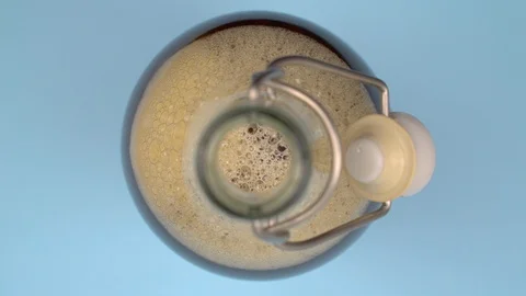 Conceptual image of popping bubble on a glass jar. 動画素材 106805355
