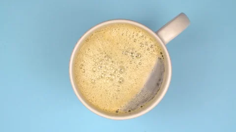 Conceptual image of popping bubble on a mug. Stock Footage 106806097