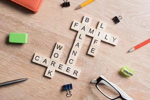 Conceptual keywords on wooden table with elements of game making crossword Stockfoto's