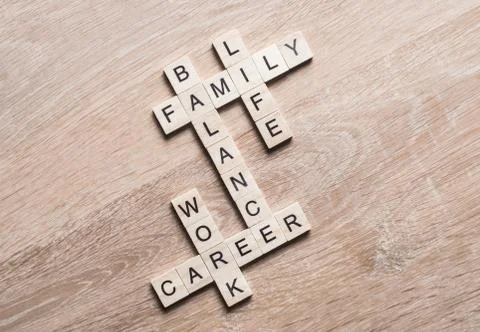 Conceptual keywords on wooden table with elements of game making crossword Stock Photos