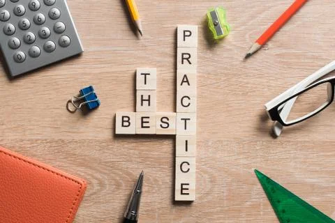 Conceptual keywords on wooden table with elements of game making crossword Stock Photos