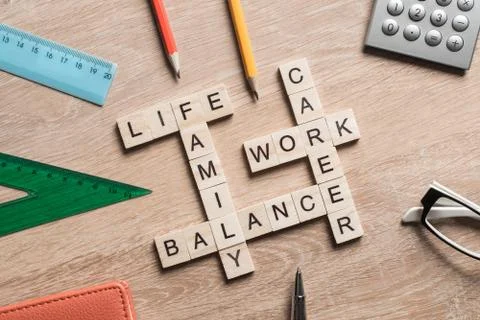 Conceptual keywords on wooden table with elements of game making crossword Stock Photos