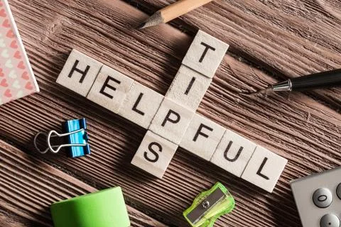 Conceptual keywords on wooden table with elements of game making crossword Stock Photos