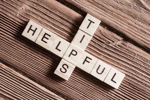 Conceptual keywords on wooden table with elements of game making crossword Stock Photos