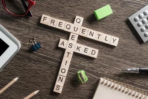 Conceptual media keywords on table with elements of game making crossword Stock Photos