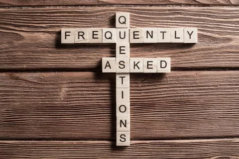 Conceptual media keywords on table with elements of game making crossword Foto stock