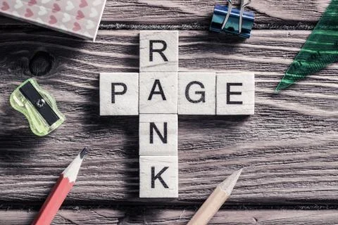 Conceptual media keywords on table with elements of game making Stock Photos