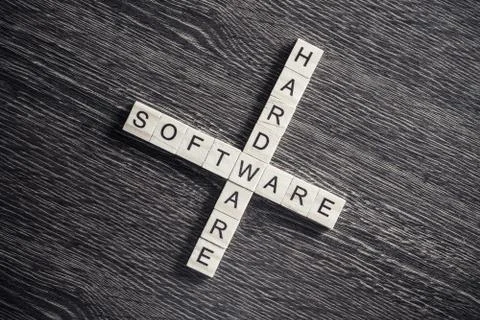 Conceptual media keywords on table with elements of game making crossword Stock Photos