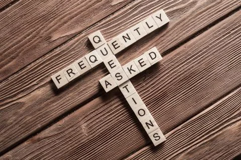 Conceptual media keywords on table with elements of game making crossword Foto stock