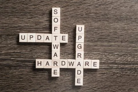 Conceptual media keywords on table with elements of game making crossword Stock Photos