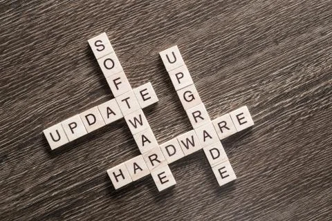 Conceptual media keywords on table with elements of game making crossword Stock Photos