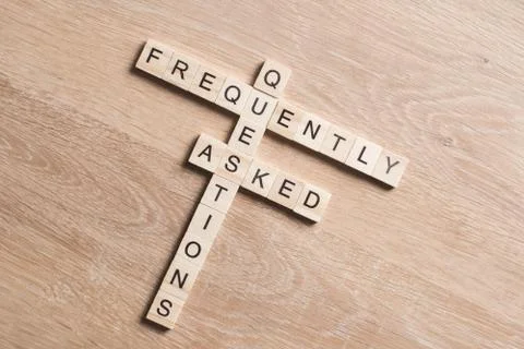 Conceptual media keywords on table with elements of game making crossword Stock Photos