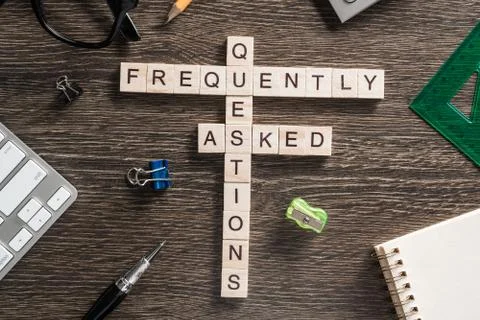 Conceptual media keywords on table with elements of game making crossword Stock Photos
