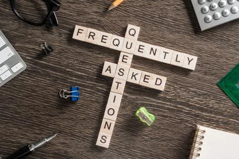 Conceptual media keywords on table with elements of game making crossword Foto stock