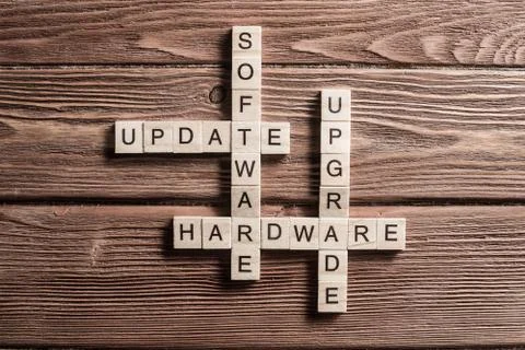 Conceptual media keywords on table with elements of game making crossword Stock Photos