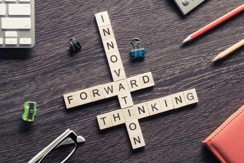 Conceptual media keywords on table with elements of game making Foto stock