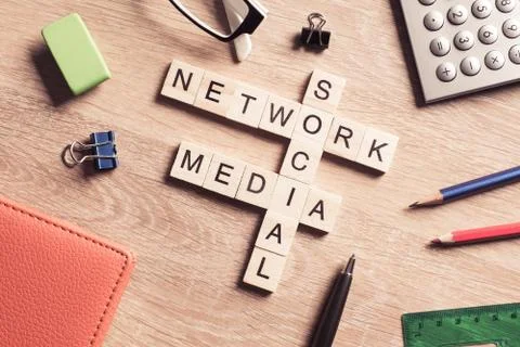 Conceptual media keywords on table with elements of game making Foto stock