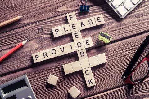 Conceptual media keywords on table with elements of game making Stock Photos