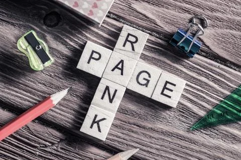 Conceptual media keywords on table with elements of game making Stock Photos